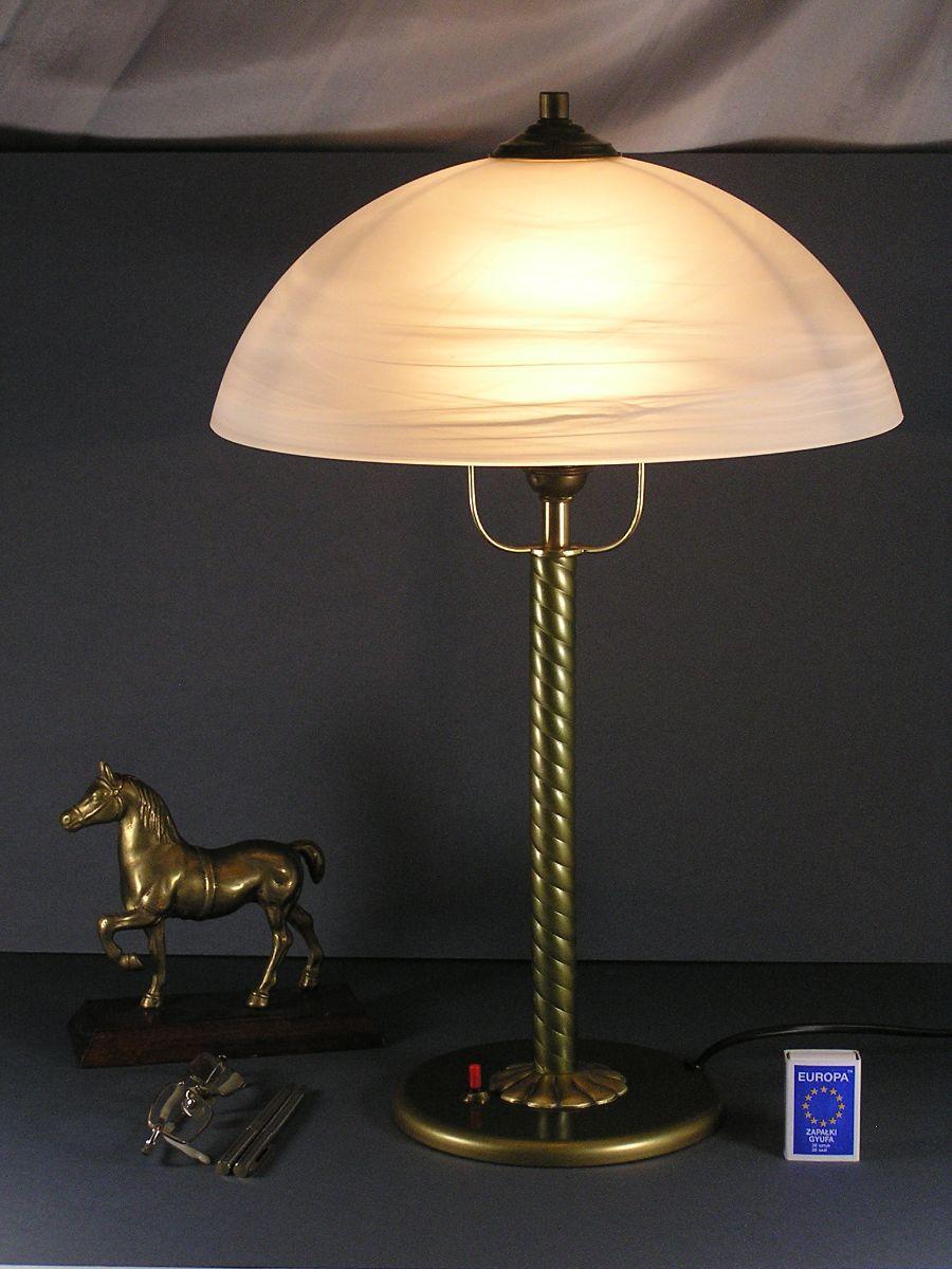 Old beautiful table lamp, desk lamp from the 1940s -
Brass lamp with a circular shape.
The lamp has a light source E27 with large thread switch in the base.
Cable replaced about 3 m long.
Electric 100% efficient.
dimensions;
The total height -