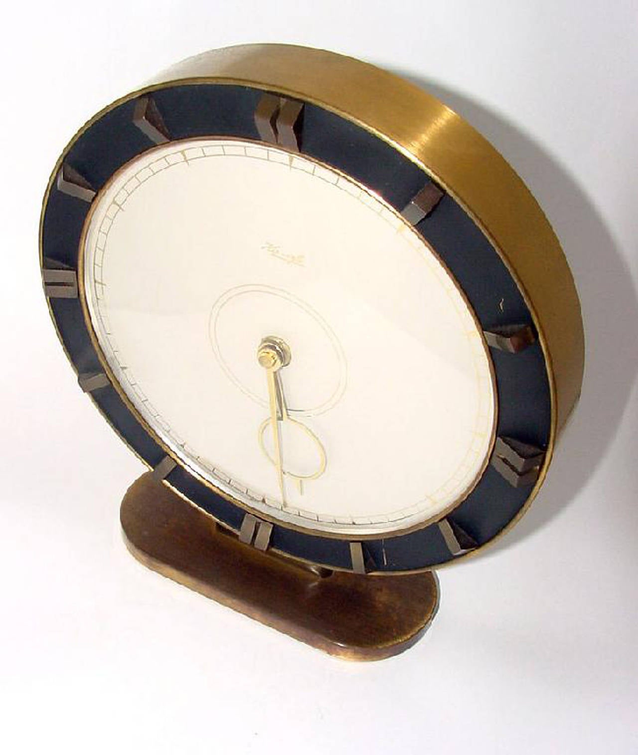 Original movement replaced to a modern quartz movement with a battery. 
The clock is in perfect condition, no major scratches, no glass scratched.
Glass cover,