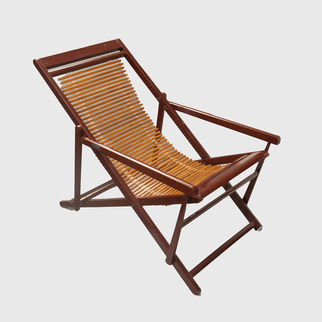 Pair of Chinese bamboo slat back and lacquered wood reclining folding lounge chairs, each bearing tag with Chinese characters and reads: Made in the Peoples Republic of China; this dates them specifically to the period from 1970-1978.
Dimensions: