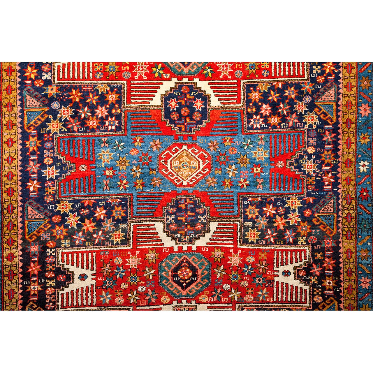 Fantastic, antique Northwest Persian carpet with a very unusual design derived from a Caucasian carpet. In excellent full pile condition with great wool and super saturated colors.
Dimensions: 6 ft 2 in. x 5 ft 4 in.
