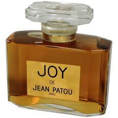 Grande bouteille de parfum Joy de Jean Patou réelle en verre