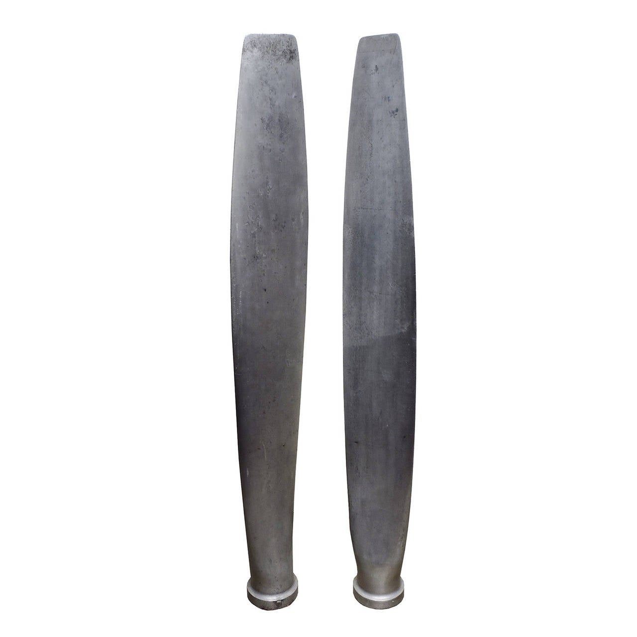 Pair of Hartzell aluminum propellers, serial n. H01578V and marked test no. OCO4. Measures: Length 43 inches, width 6 3/8 inches.
Great sculptural objects for hanging or freestanding.