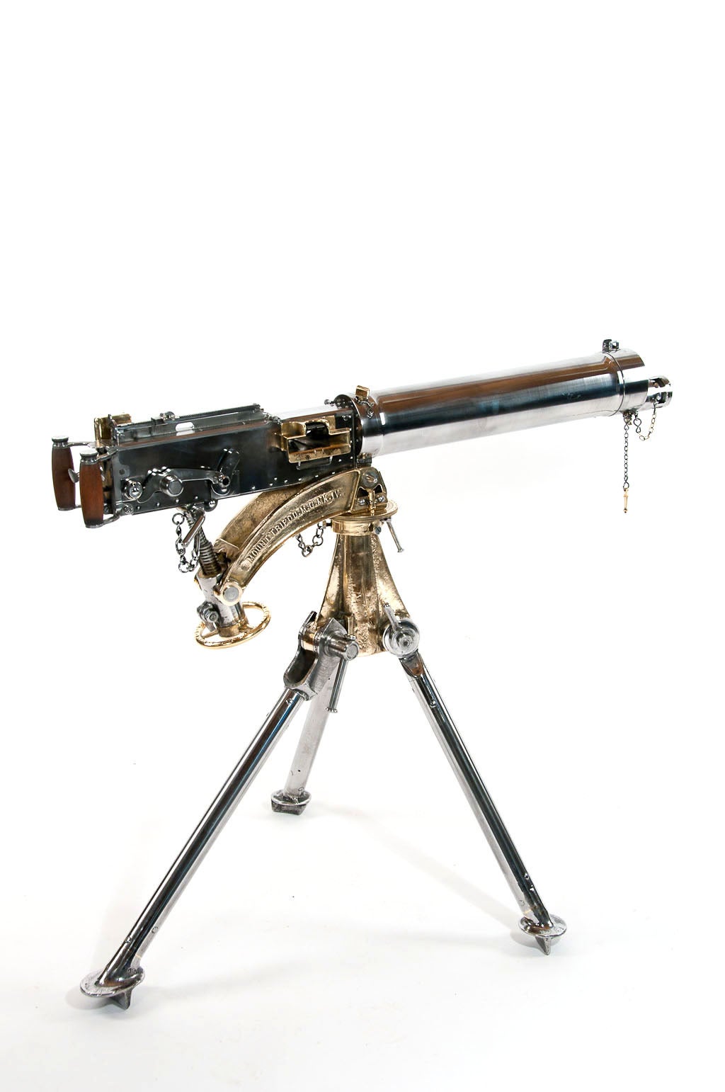 An extremely rare fully polished Vickers Machine Gun on tripod. In stunning condition this WW2 Vickers .303 Heavy Machine Gun dated 1942 to the tripod is a fully functional deactivated smooth jacket water cooled model with stamped serial number
