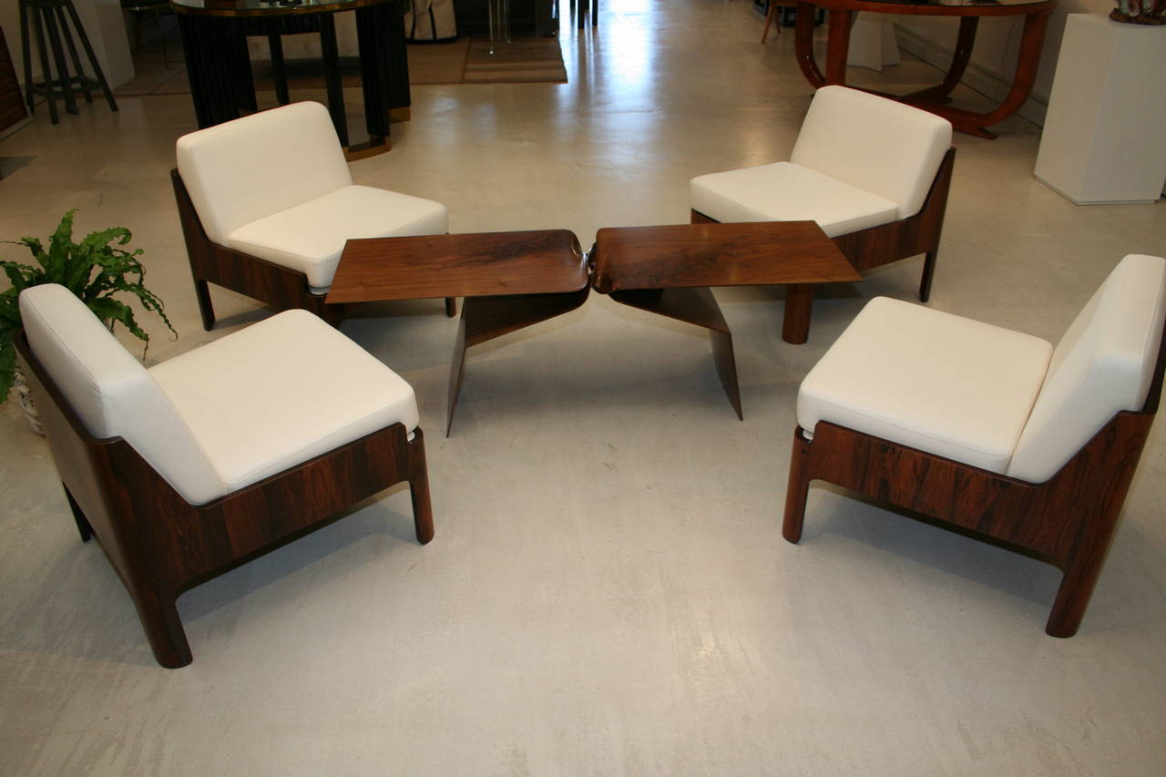 Set of four vintage Isamu Kenmochi lounge chairs. Newly upholstered in 2015. Can be sold as a pair for $8,000 or a set of four for $16,000. Brazilian rosewood. Excellent condition.