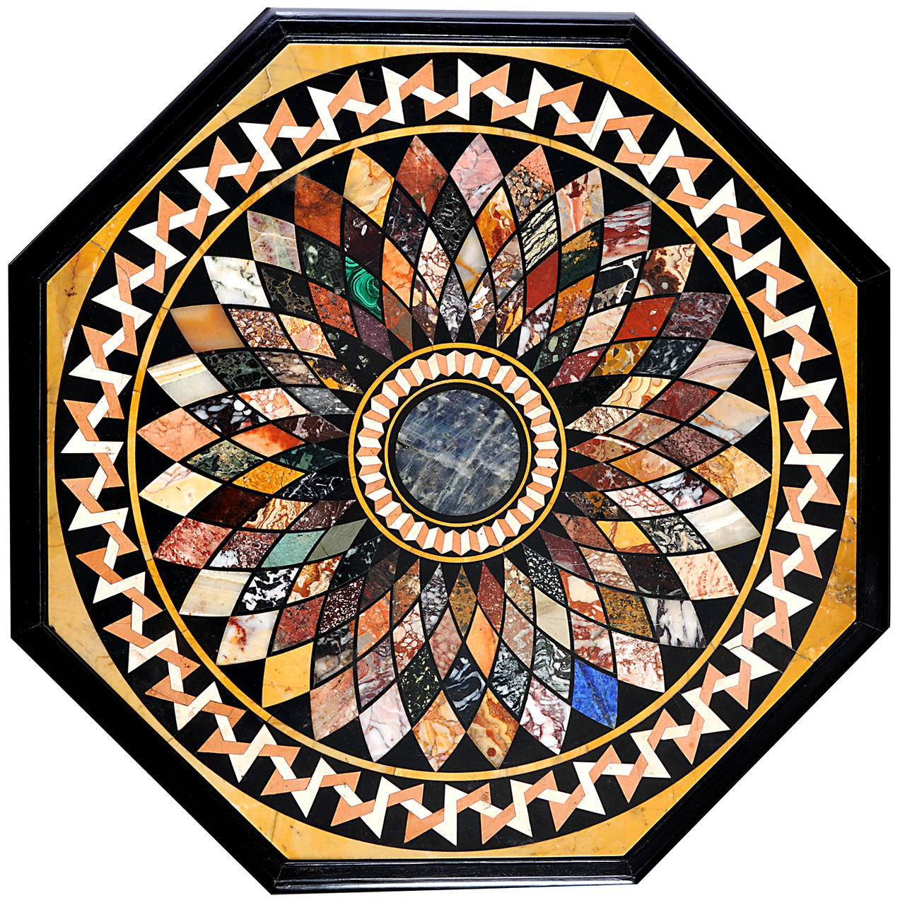 The inlaid marble top, circa 1820-1830; the Sinhalese ebony base of a similar date.

From the 18th century there was a insatiable demand for Italian inlaid marble table-tops, often carefully assembled from ancient fragments, thus perpetuating the
