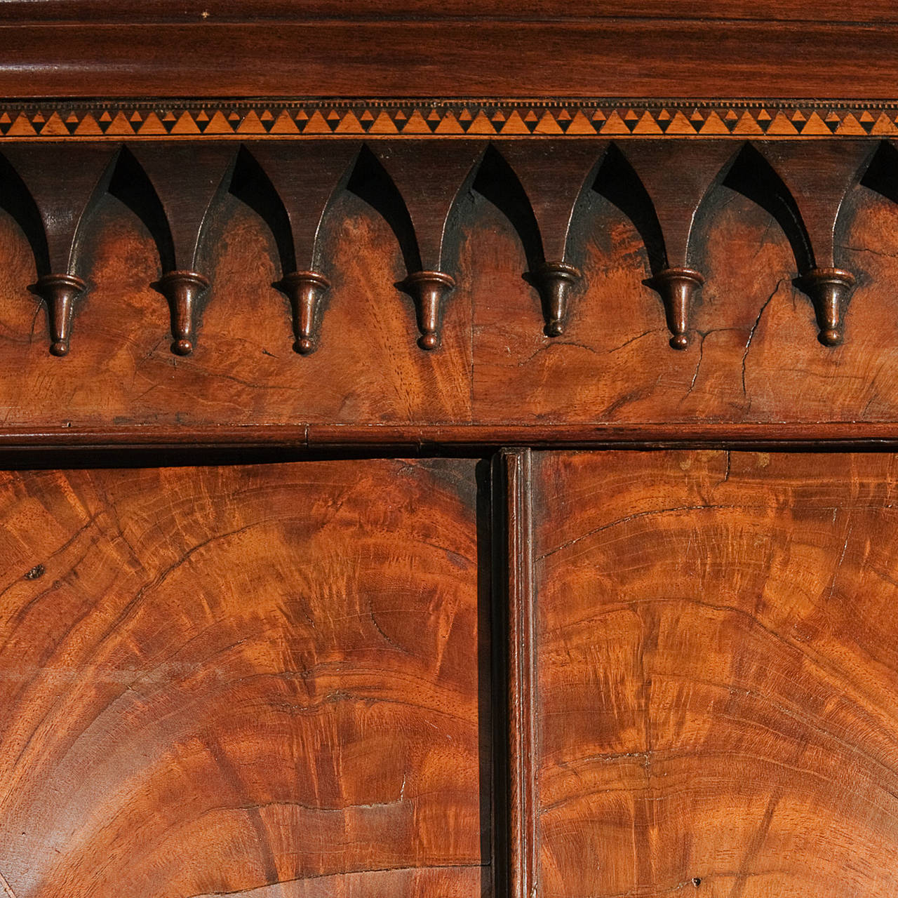 Provenance: Acquired directly from a private collection, Cardiff, Wales.

This late 18th century linen press, veneered in Honduras mahogany of an exceptional golden colour and vigour, inlaid with Tunbridge ware, is in an excellent state of
