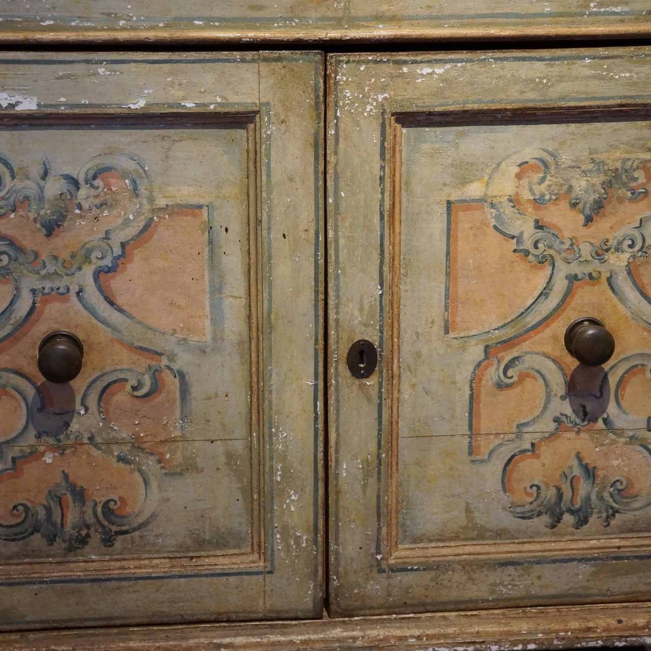18th century Italian credenza with original paint and hardware.