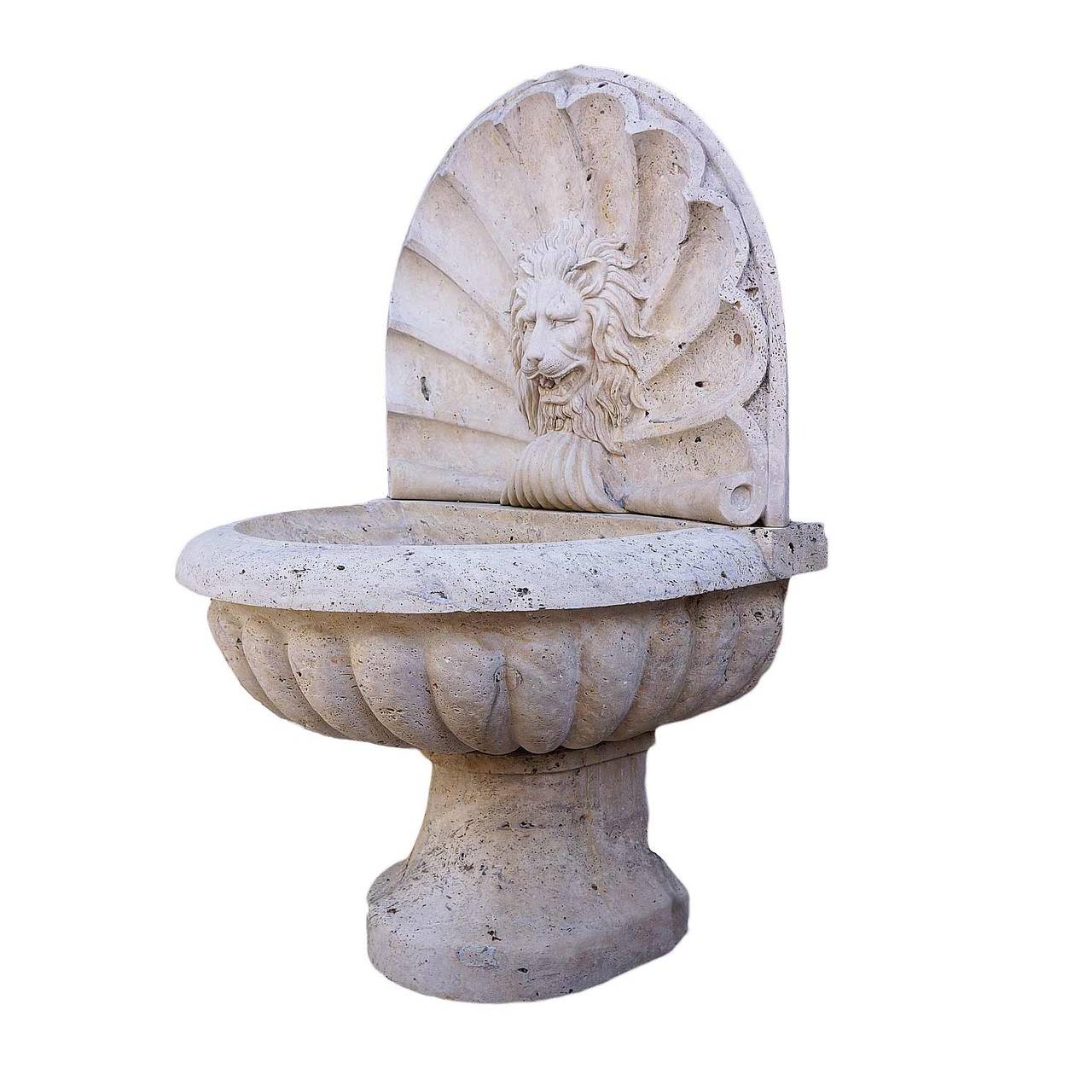 Italian Stone Fountain with Carved Lion Face Against a Shell Background