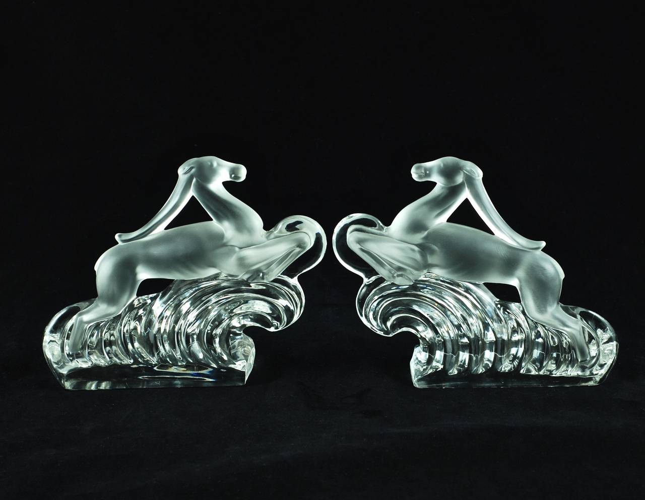 Steuben Glass gazelle bookends. This rare pair of highly collectible bookends was made by Steuben Glass of Corning, New York. Steuben Glass Works was founded by Frederick Carder and Thomas Hawkes in 1903, and produced highly sought after art glass