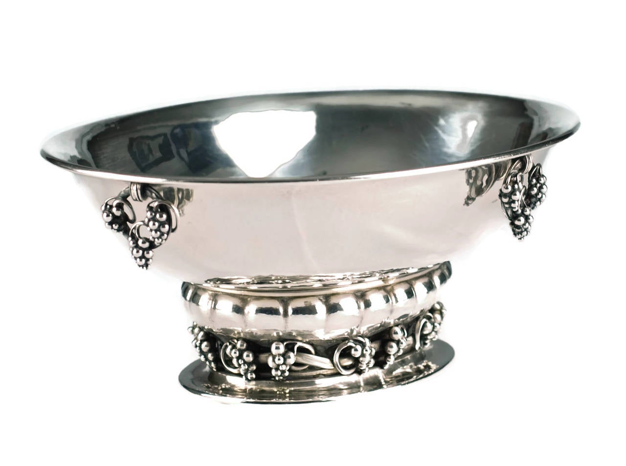 Vintage Georg Jensen sterling silver oval centerpiece bowl - grape motif. This fabulous pre 1945 Georg Jensen oval centerpiece bowl has been made from sterling silver. The bowl has a hand-hammered finish and is a wonderful example of Jensen's iconic