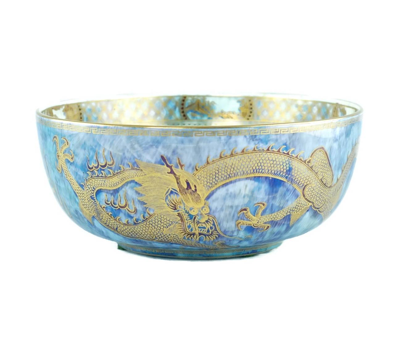 This English porcelain bowl is from Wedgwood's eminently collectible Fairyland Lustre range designed by artist Daisy Makeig-Jones. Fairyland Lustre, introduced in 1915, was a radical departure from Wedgwood's traditional 18th and 19th century