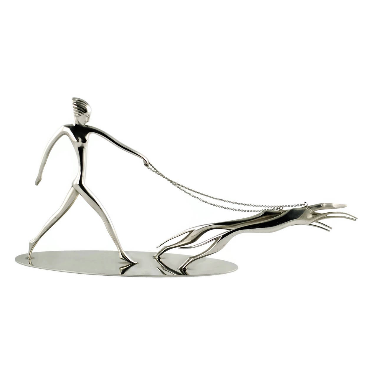 This dynamic sculpture was designed by Austrian sculptor Karl Hagenauer, known for his iconic Art Deco decorative objects and furniture designs. This piece is composed of nickel-plated brass and features the highly stylized image of a lithe woman,