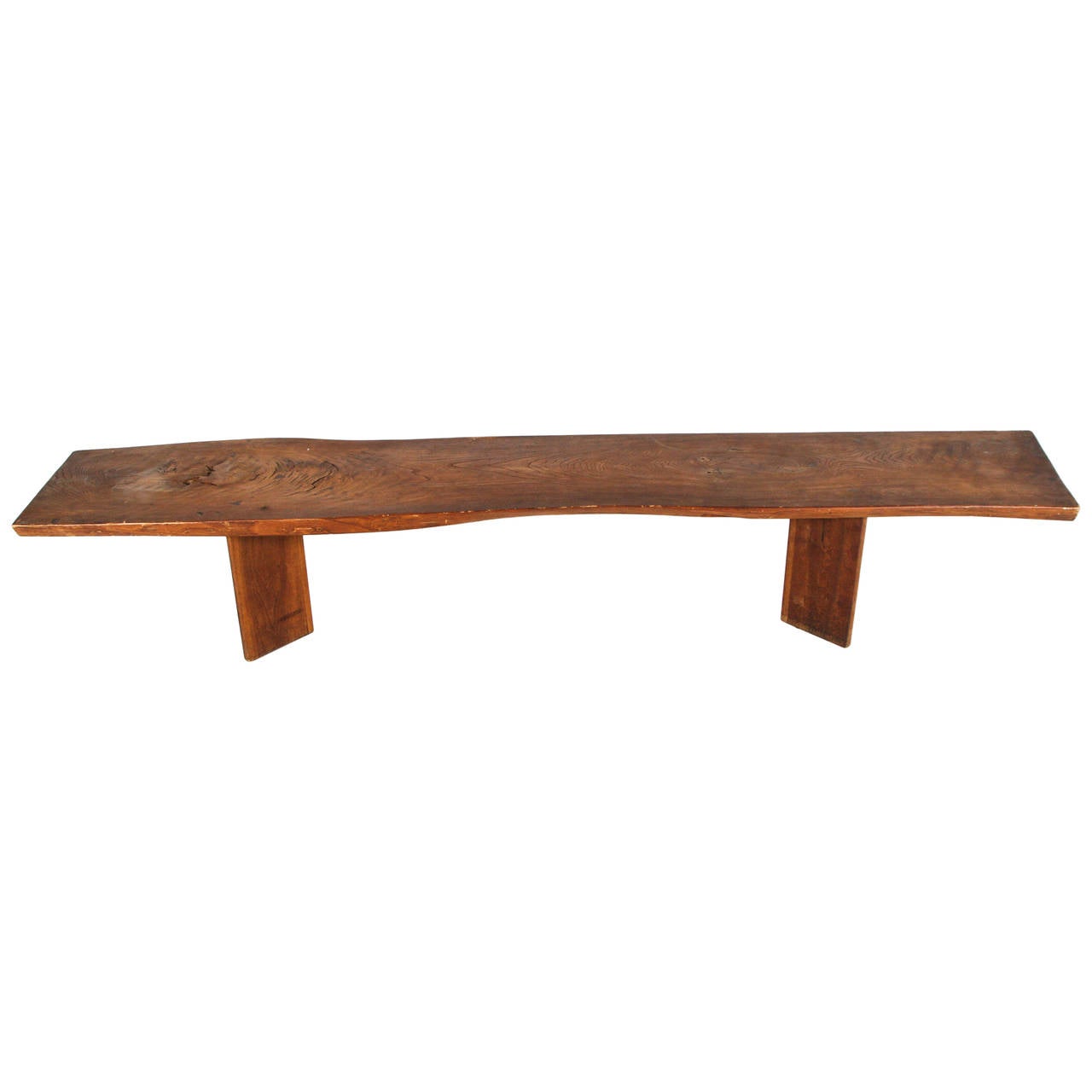 Handmade free form solid wood coffee table/bench in the style of Nakashima. Made in USA, circa 1960s.