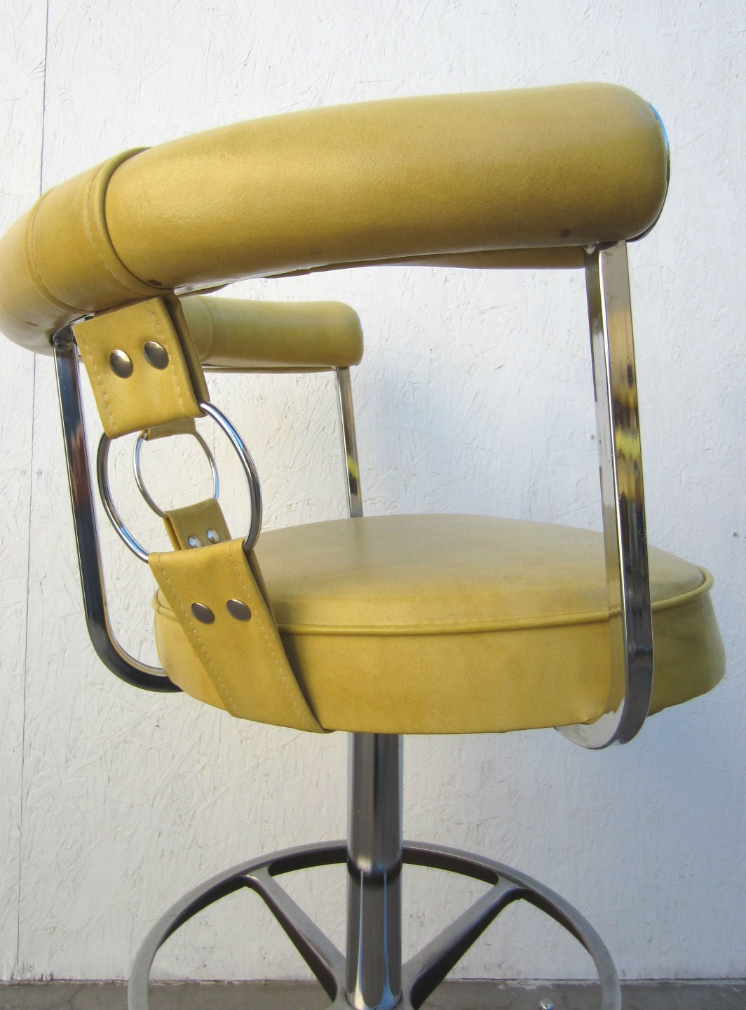 American Trio of Hollywood Regency Chrome and Yellow Bar-Arm Stools
