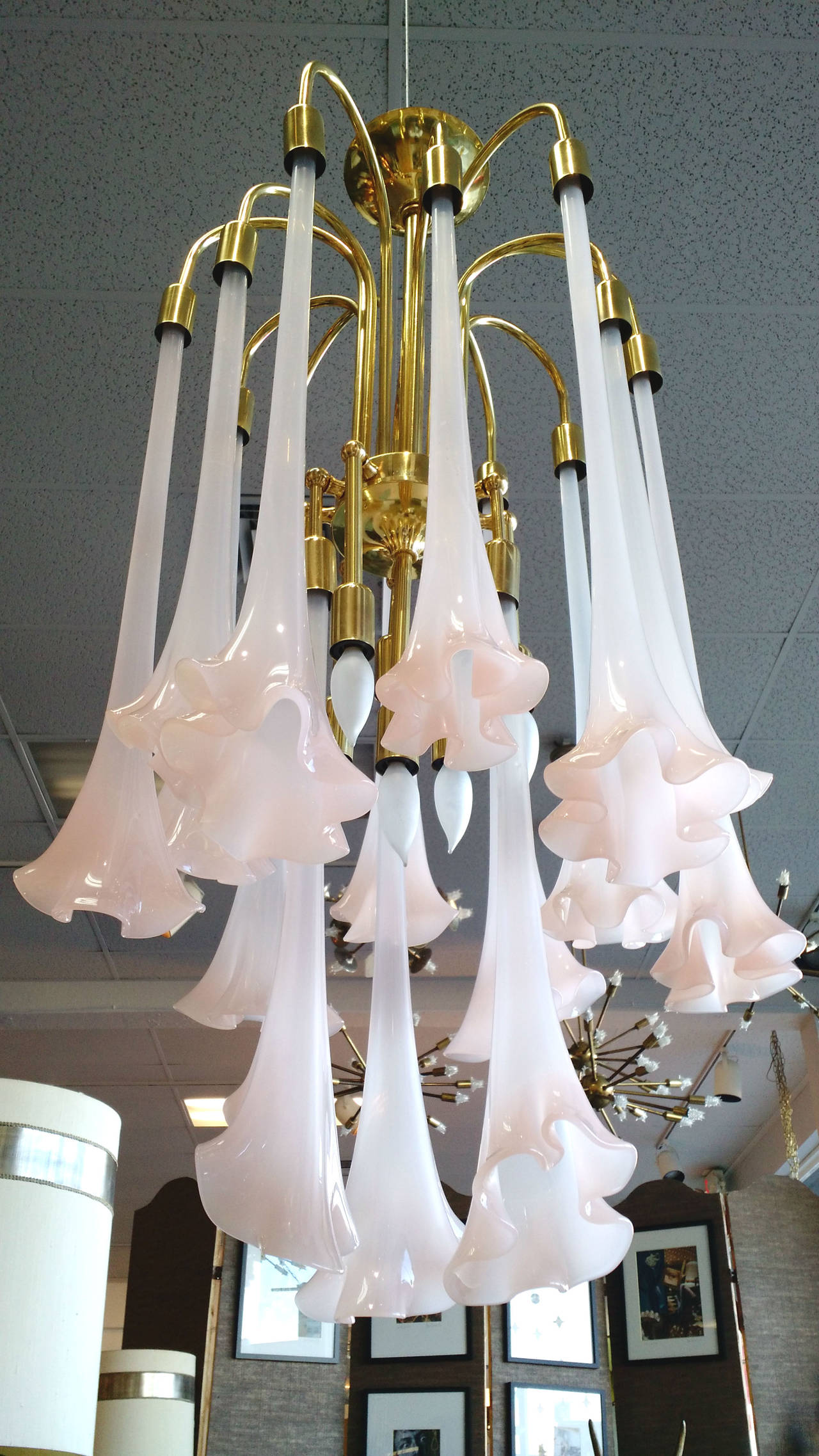 15 handblown soft pink art glass Angel's Trumpet flowers hanging from gleaming brass 