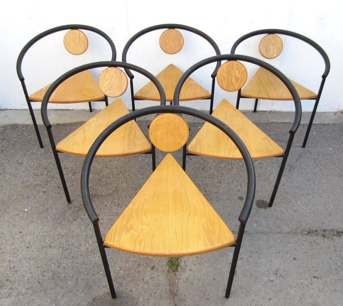 A set of six Memphis era Chairs in the style of Michele De Lucchi 