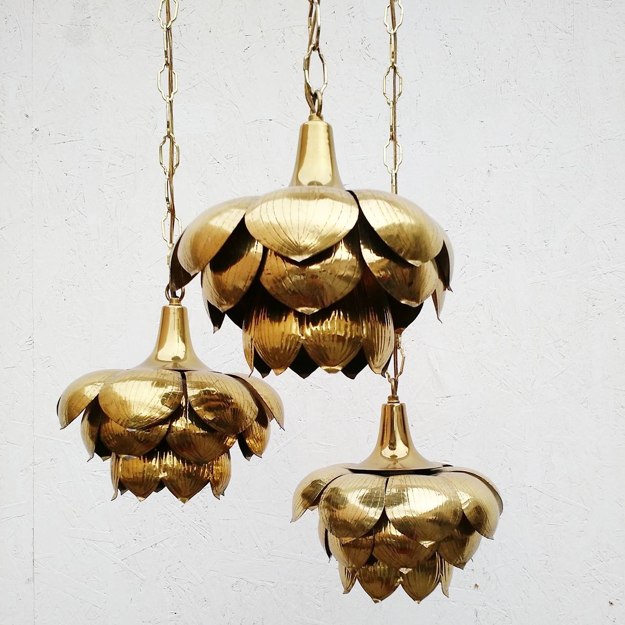 Brass pendant chandelier with three chain hanging lotus flowers, circa 1950s.
Huge mirror finish brass dish ceiling cap,
Marked 