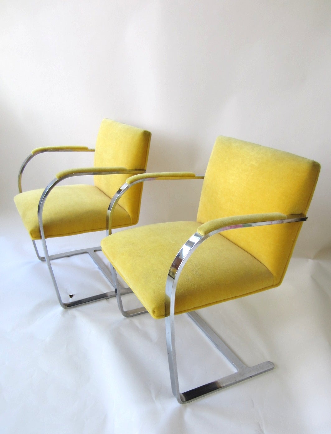 Set of six plated flat bar steel BRNO chairs designed by Mies van der Rohe, circa 1960s. Upholstered in Italian yellow Mohair.