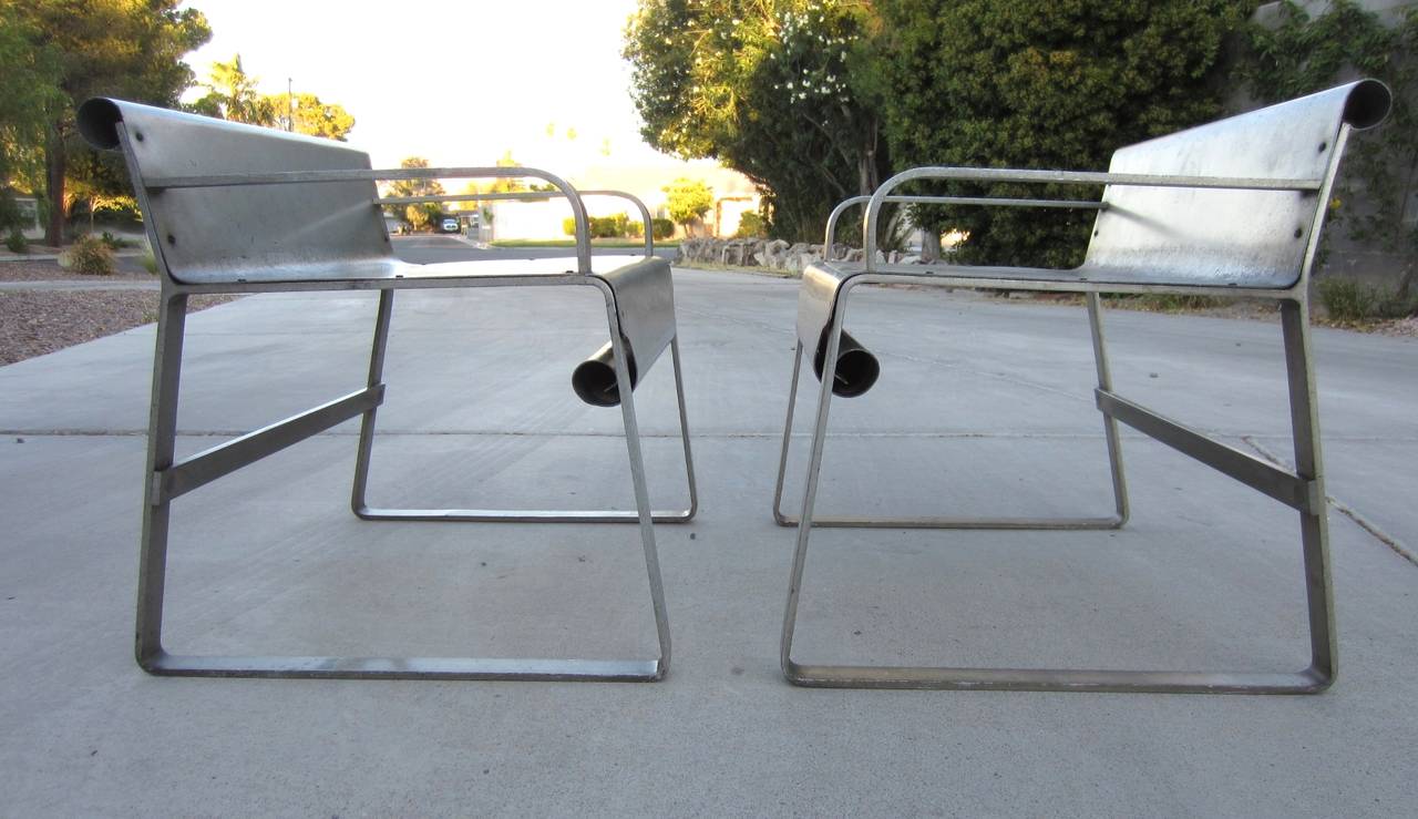 Ultra rare pair of aluminum armchairs by 