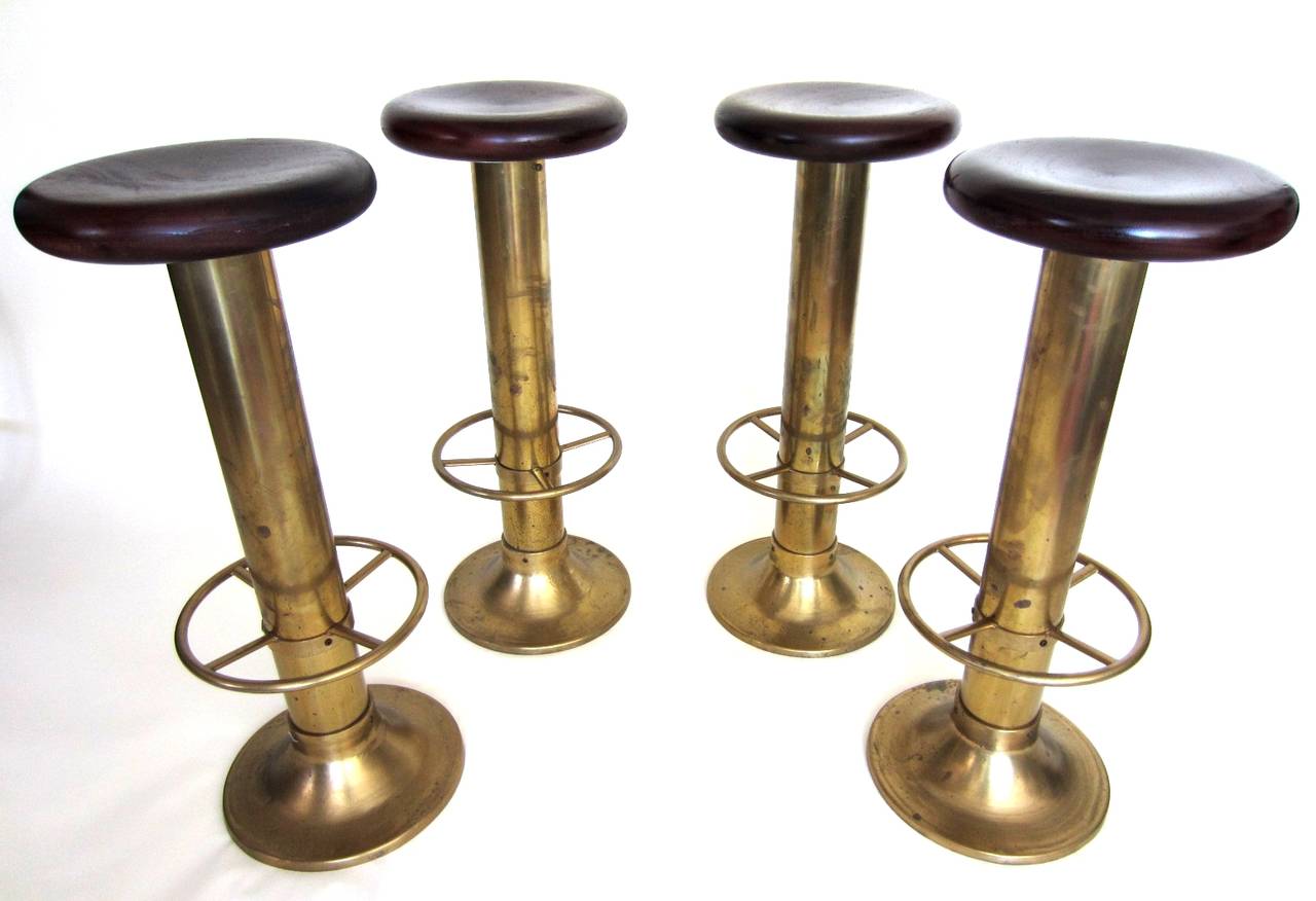 Amazing set of 4 solid brass ship bar stools circa 1940's.
Very comfortable. 32