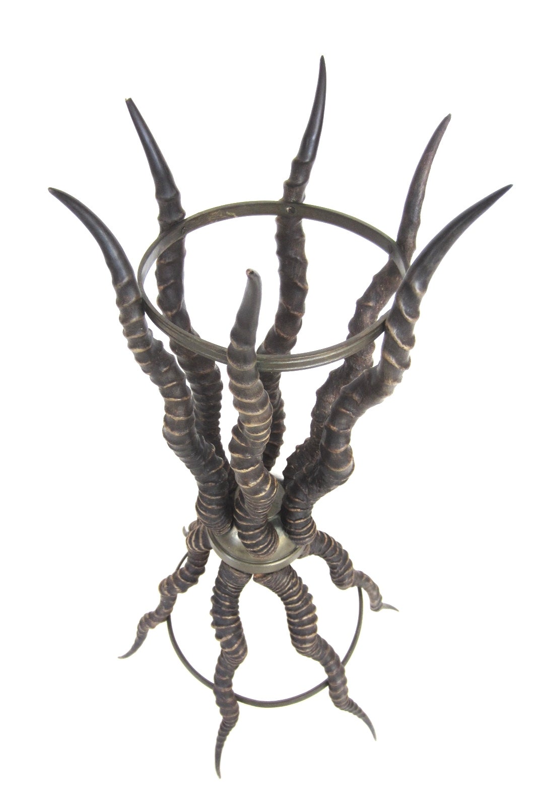Large circa 1890s Victorian plant pedestal floor stand sculpted of 
12 African gazelle horns affixed to a center bronze ball with bronze rings
at top and bottom.
Could be used to hold an ice bucket.
Solid and well crafted piece in excellent