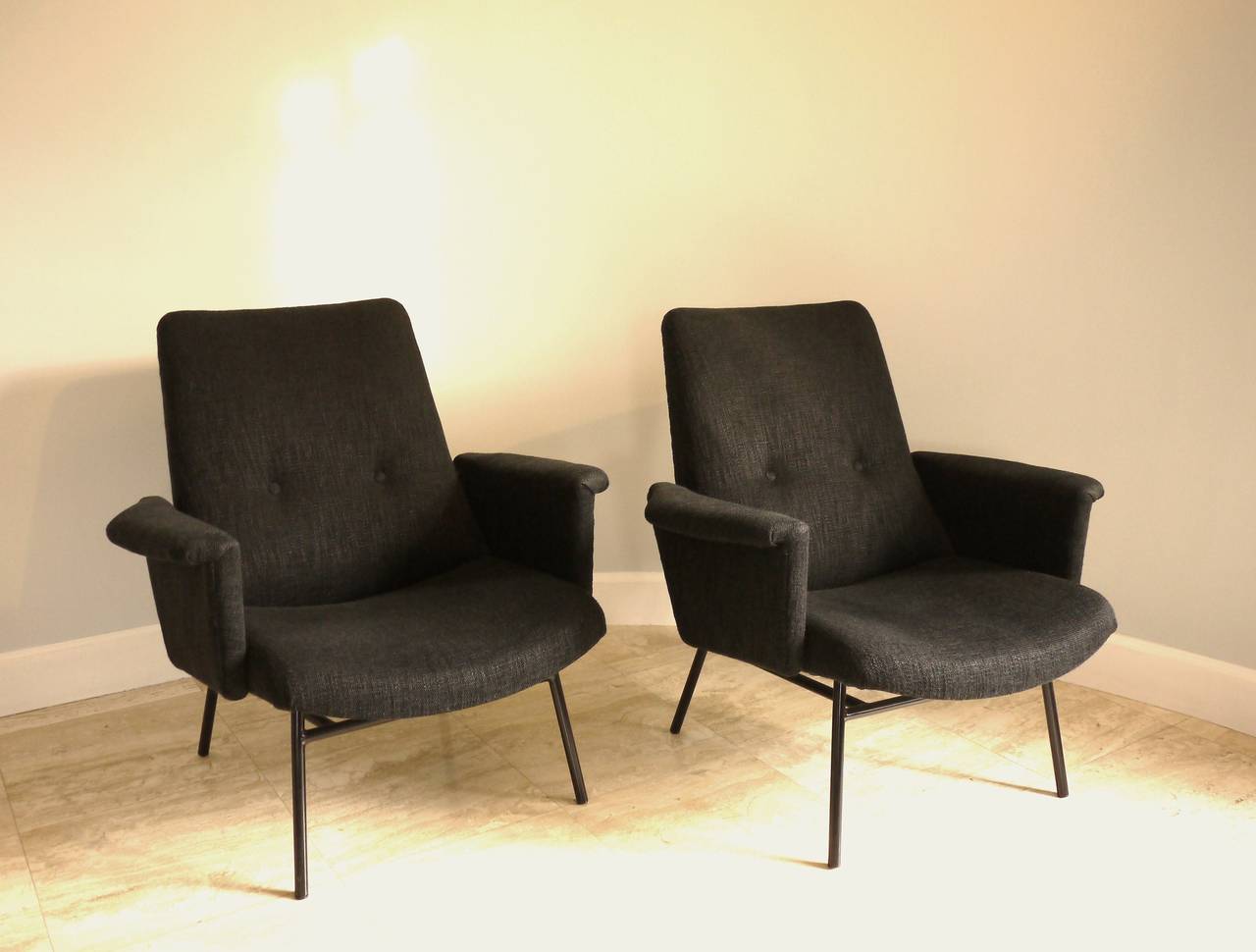 Pair of SK660 armchairs by Pierre Guariche for Steiner editor in 1953. New foam and dark grey wool upholstery.