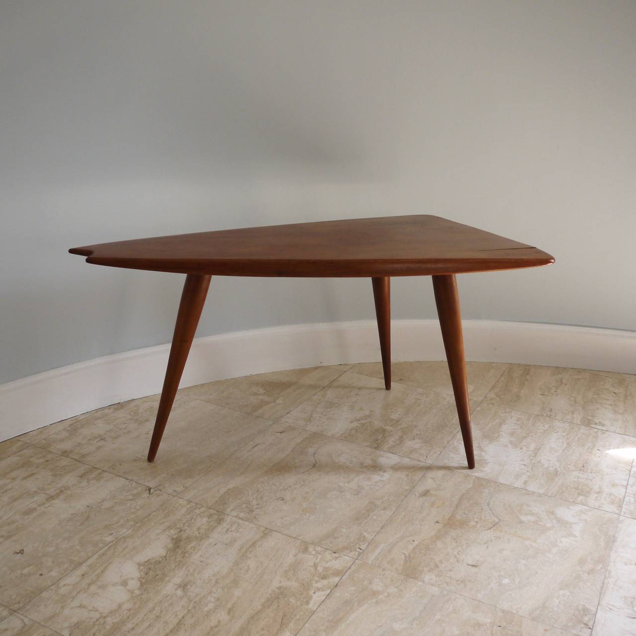 Rare mahogany side table with three legs by Pierre Cruège in 1955.