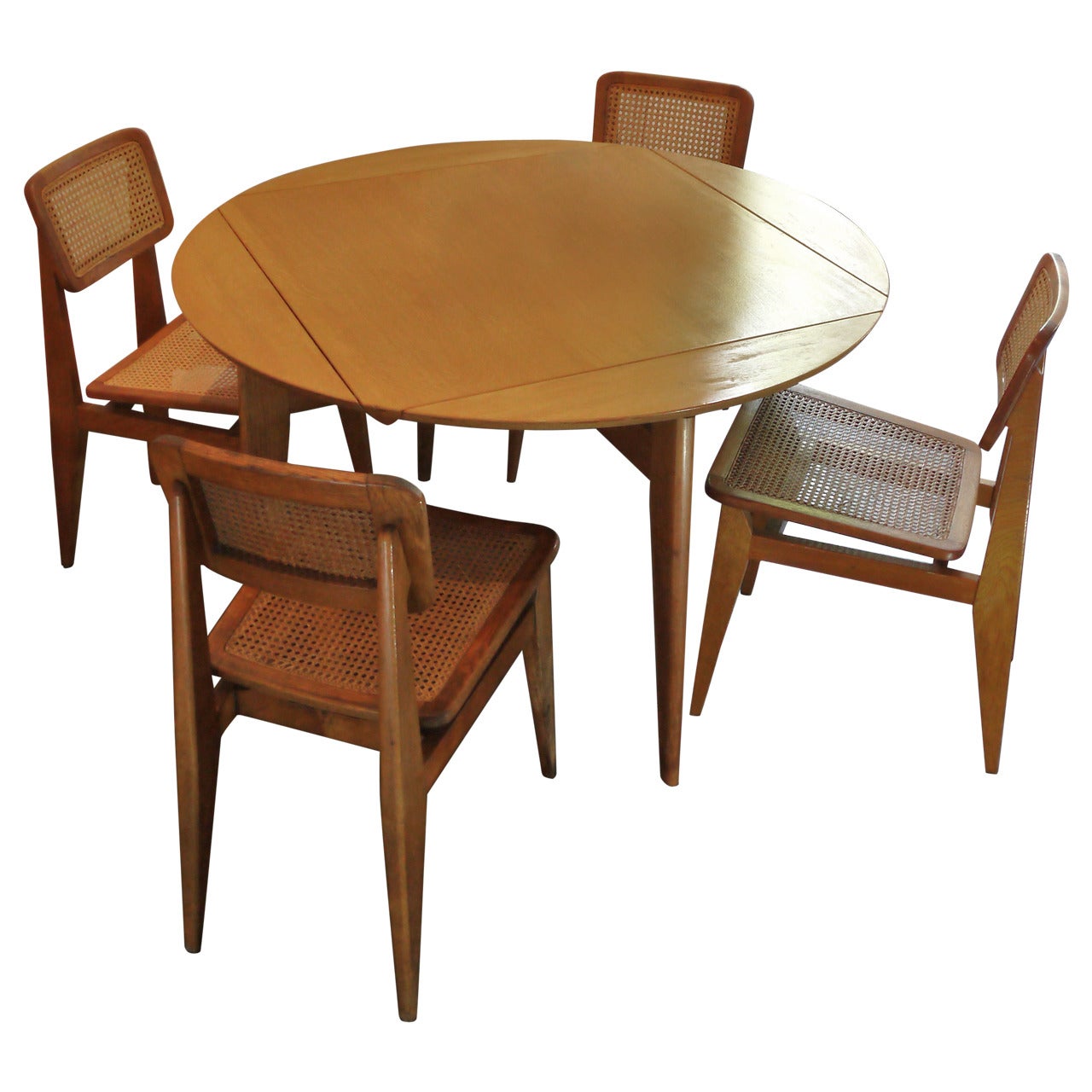Set of Four Caned Chairs by Marcel Gascoin
