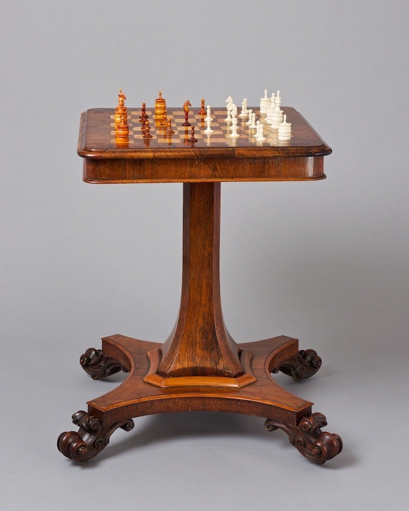 A superb William IV rosewood pedestal chess table (chessboard inlaid with rosewood and bird's eye maple). Bone chess pieces sold separately.