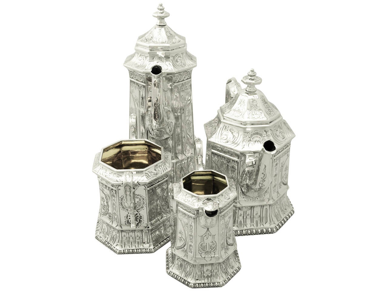 An exceptional, fine and impressive antique Victorian English sterling silver four piece tea and coffee service / set made by Joseph Angell II; an addition to our silver teaware collection.

This exceptional antique Victorian sterling silver four
