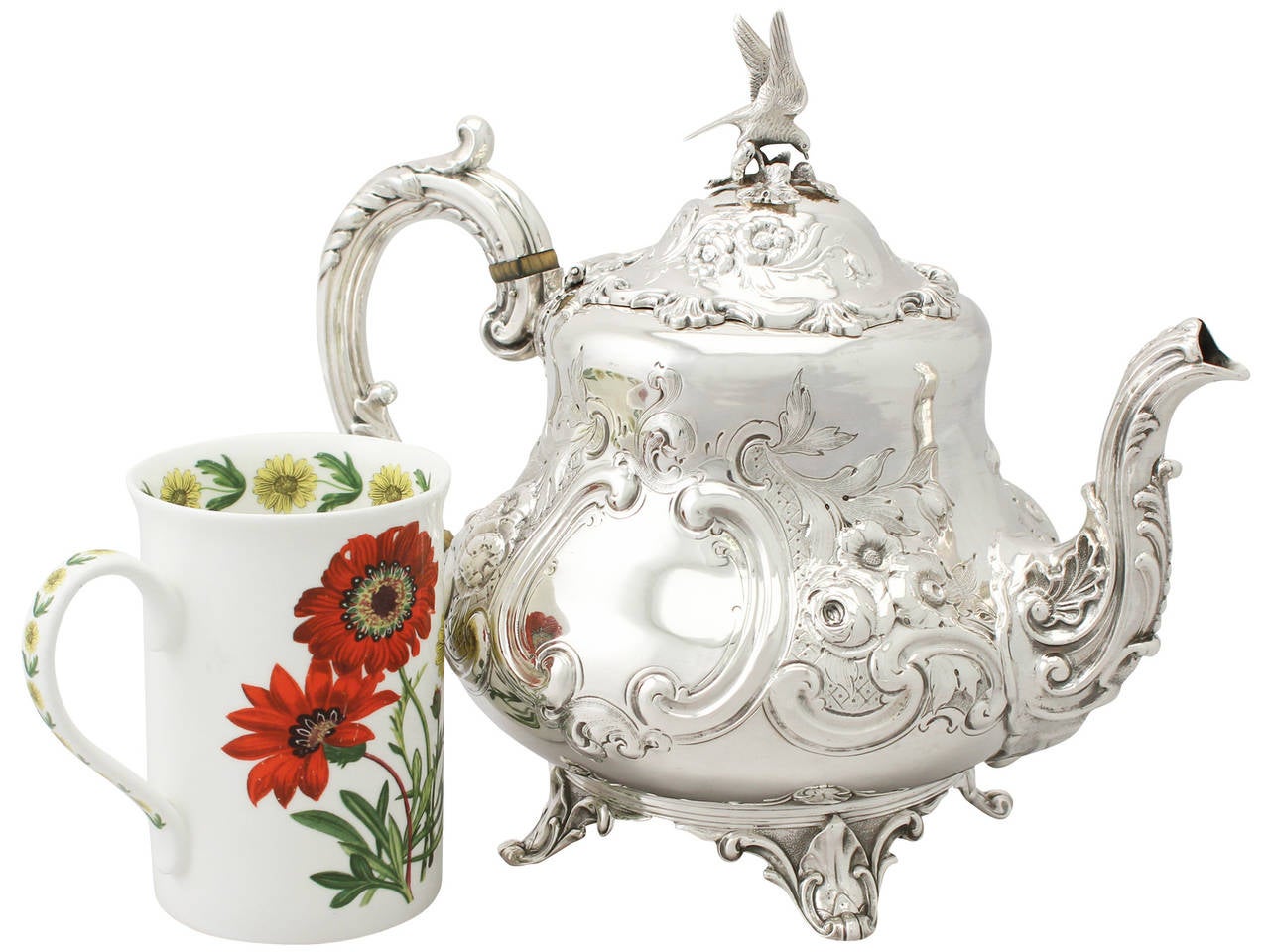 A fine and impressive antique Victorian English sterling silver teapot in the Louis style; an addition to the silver teaware collection.

This impressive antique Victorian sterling silver teapot has a baluster form in the Louis style.

The lower