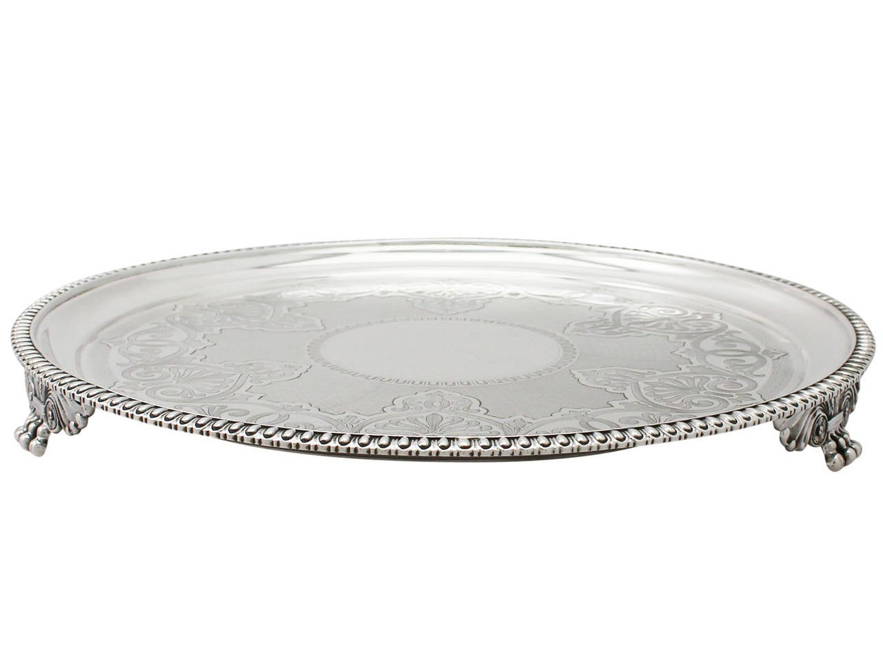 An exceptional, fine and impressive antique Victorian English sterling silver salver made by Barnard & Sons Ltd; an addition to our ornamental silverware collection.

This exceptional antique Victorian sterling silver salver has a plain circular