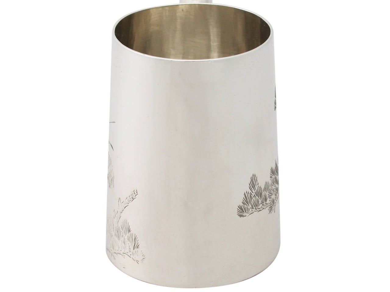 A fine antique Chinese Export Silver christening mug; an addition to our Chinese/Asian silverware collection.

This fine antique Chinese Export Silver (CES) christening mug has a cylindrical tapering form.

The surface of the mug is embellished
