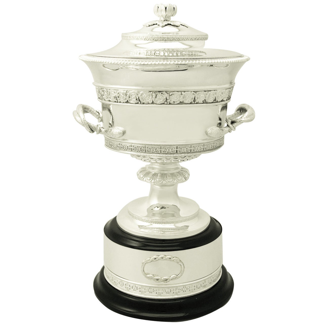 An exceptional, fine and impressive antique George V English sterling silver presentation cup with cover and original ebonised plinth; an addition to our presentation silverware collection.

This exceptional antique silver presentation cup has a