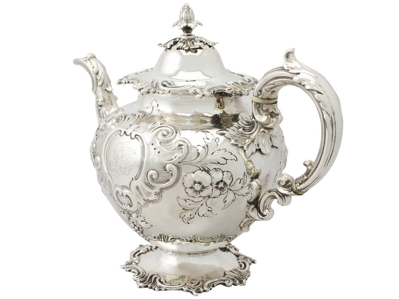 An exceptional, fine and impressive antique Victorian English sterling silver teapot made by Edward and John Barnard, an addition to our range of collectable silver teaware.

This exceptional antique Victorian sterling silver teapot has a circular