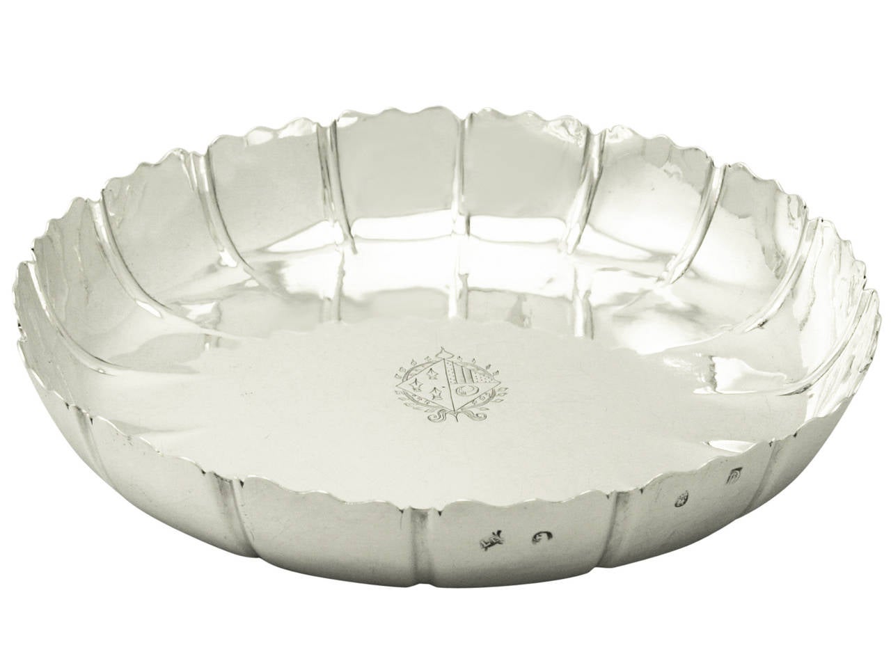 A fine and impressive antique Queen Anne Britannia standard silver strawberry dish; an addition to our dining silverware collection

This fine antique Queen Anne Britannia standard silver* strawberry dish has a plain circular form.

The panelled