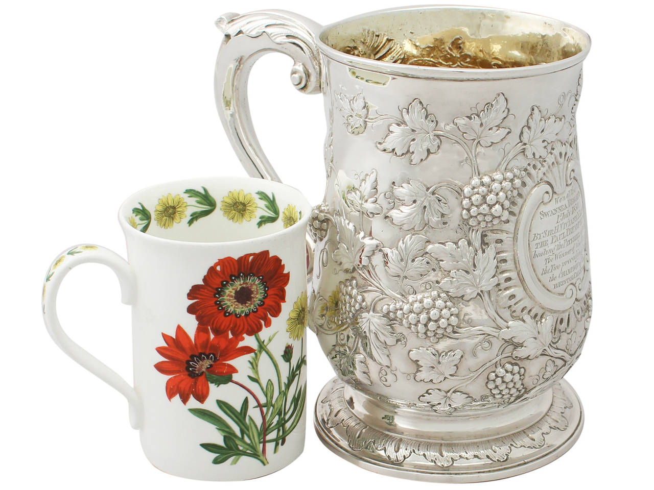 An exceptional, fine and impressive, large antique Georgian English sterling silver quart mug; an addition to our range of wine and drinks related silverware collection

This exceptional antique George III sterling silver mug has a baluster shaped