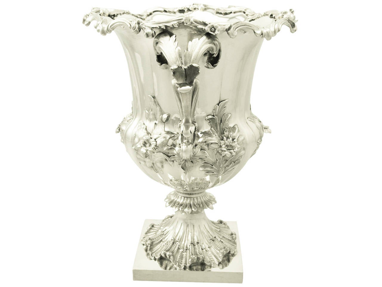 A fine and impressive antique early Victorian sterling silver wine cooler; part of our antique wine / drink related silverware collection

This fine antique Victorian sterling silver wine cooler has a campania shaped form onto a cast square