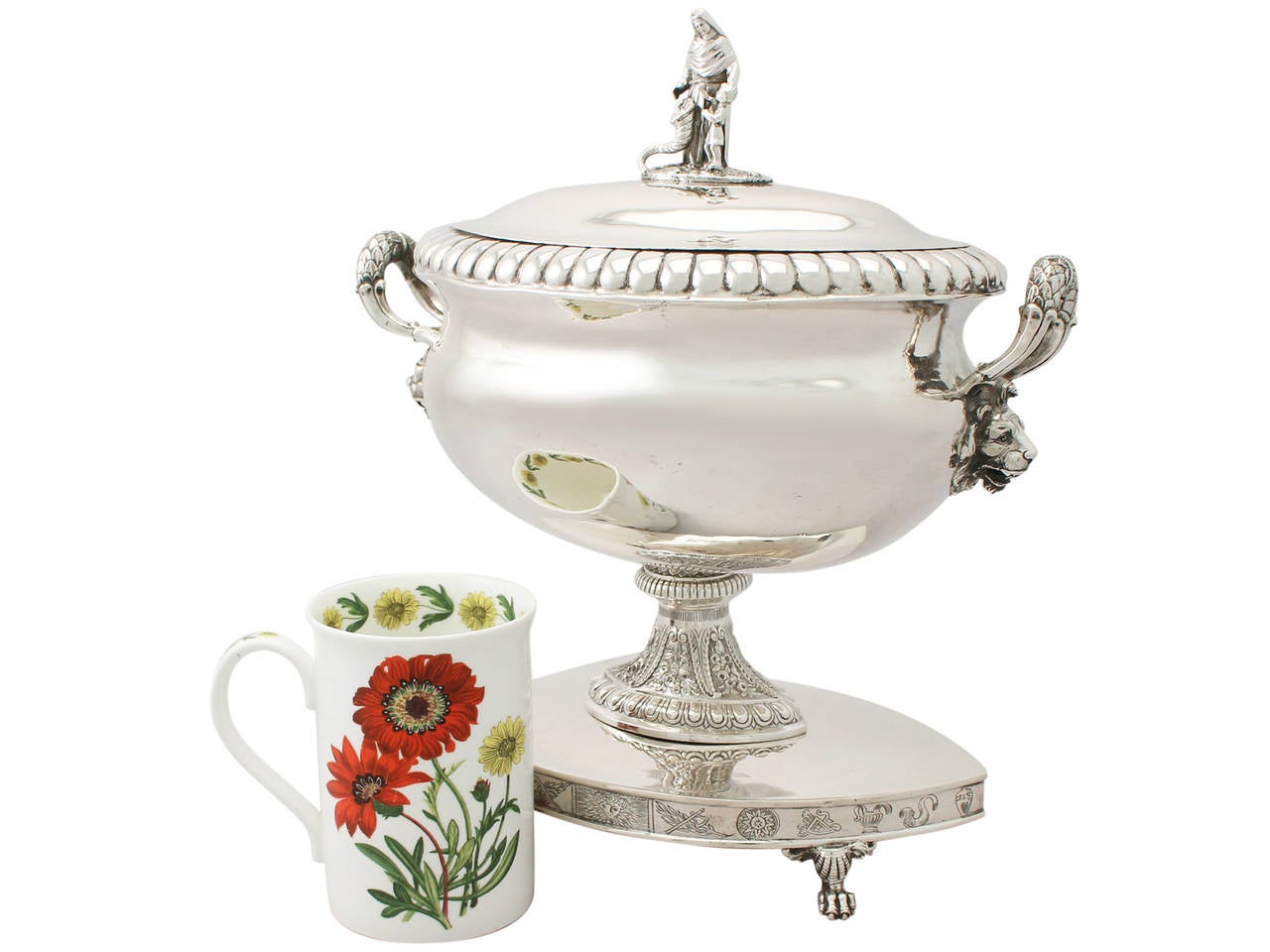 A fine and impressive antique German silver tureen; an addition to our diverse dining silverware collection.

This fine antique German silver tureen has an oval rounded form onto a pedestal foot and navette shaped base.

The body of this German