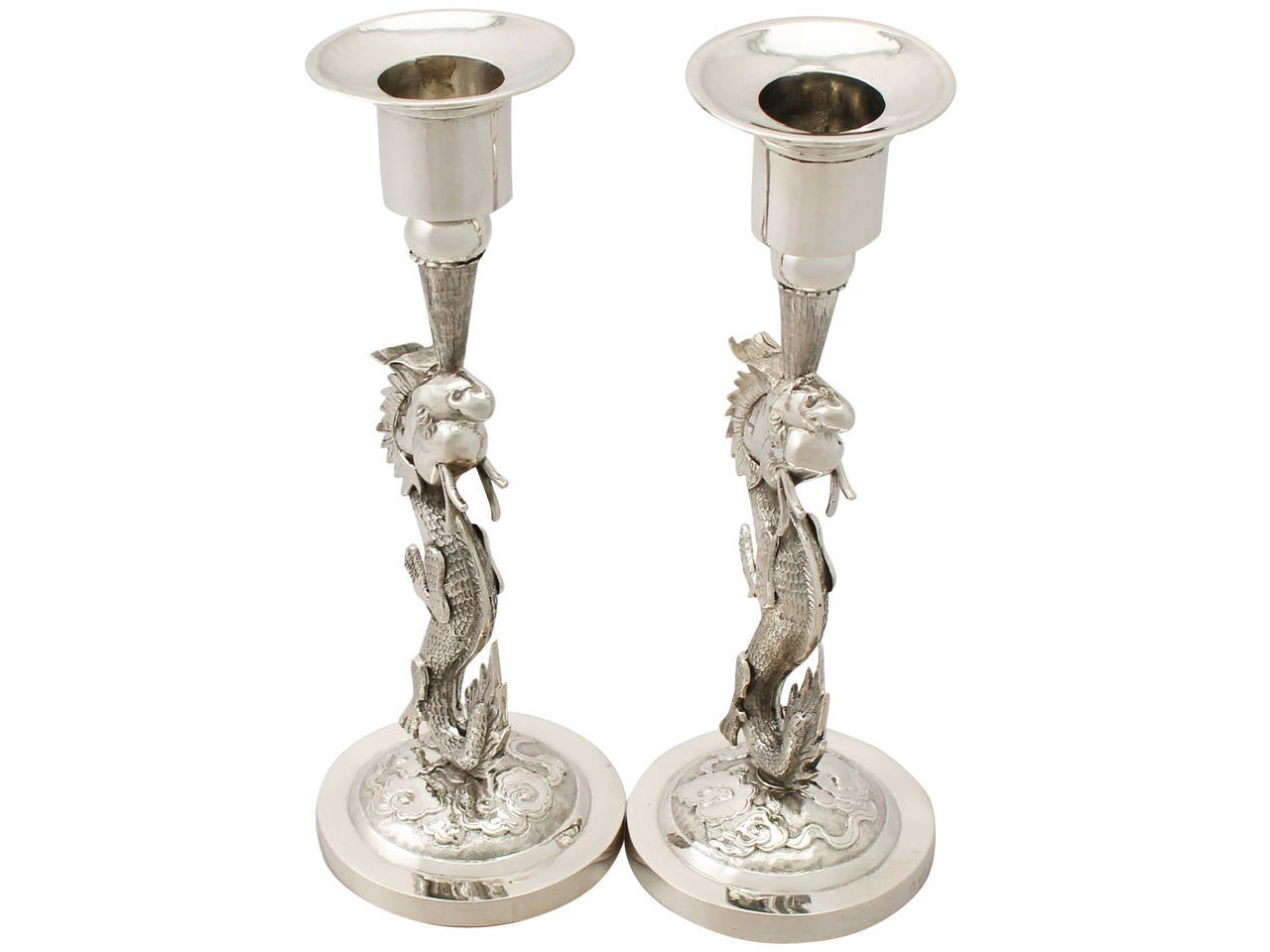 An exceptional, fine and impressive pair of antique Chinese Export silver dragon candlesticks; an addition to our ornamental silverware collection.

These fine antique Chinese Export silver (CES) candlesticks have been modelled in the form of a