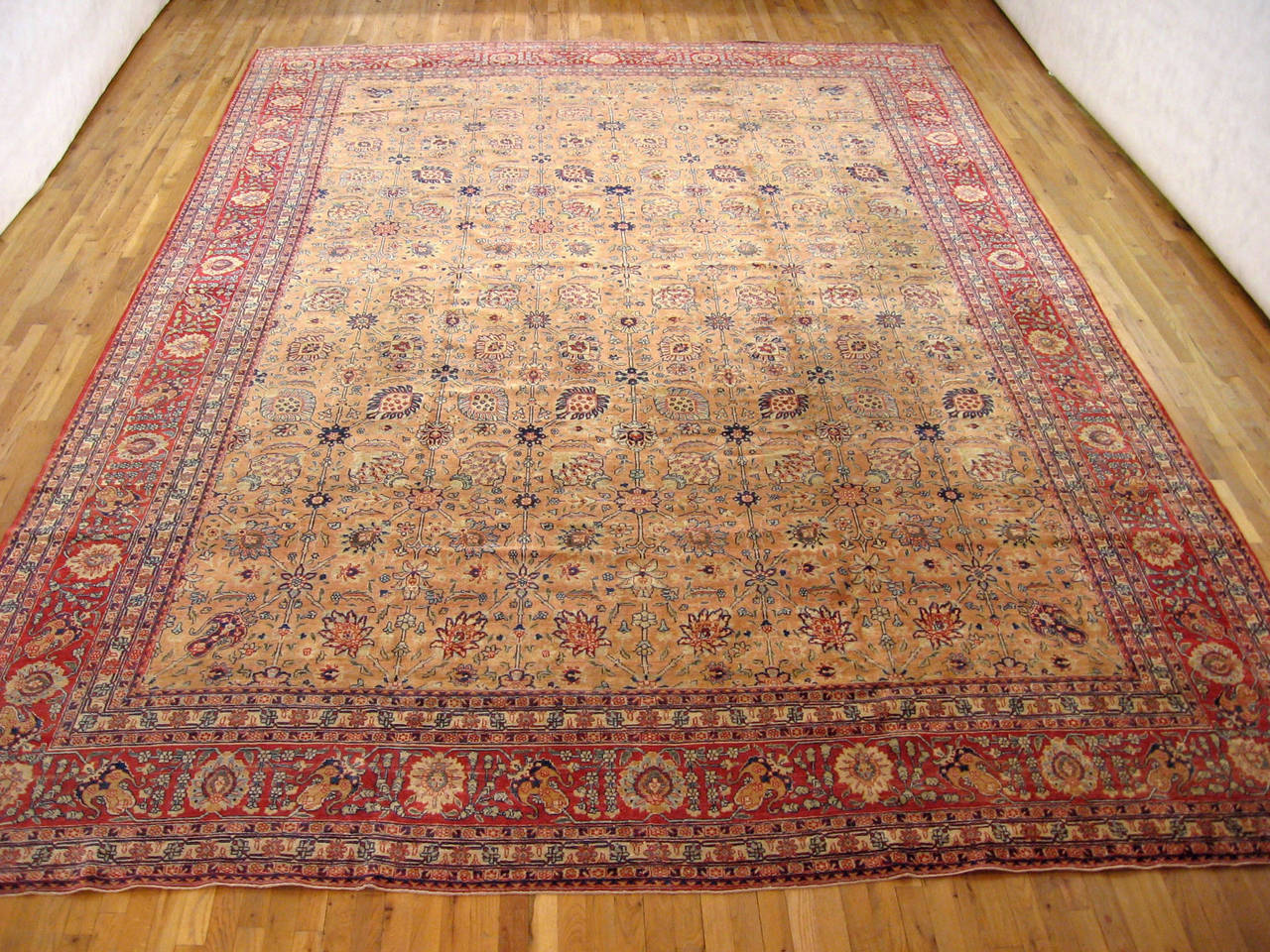 An elegant antique Persian Tabriz carpet, circa 1900, size 16'7