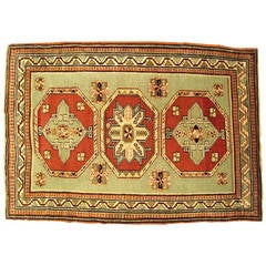 Antique Caucasian Kazak Oriental Rug, in Small Squarish Size w/ Green Background 1