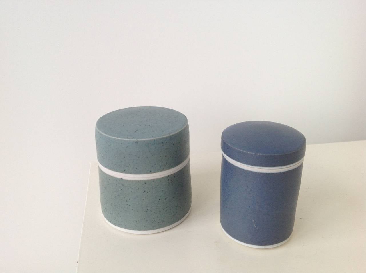 Two small glazed porcelain boxes made by the ceramist Geert Lap (1951) in the 1970s.