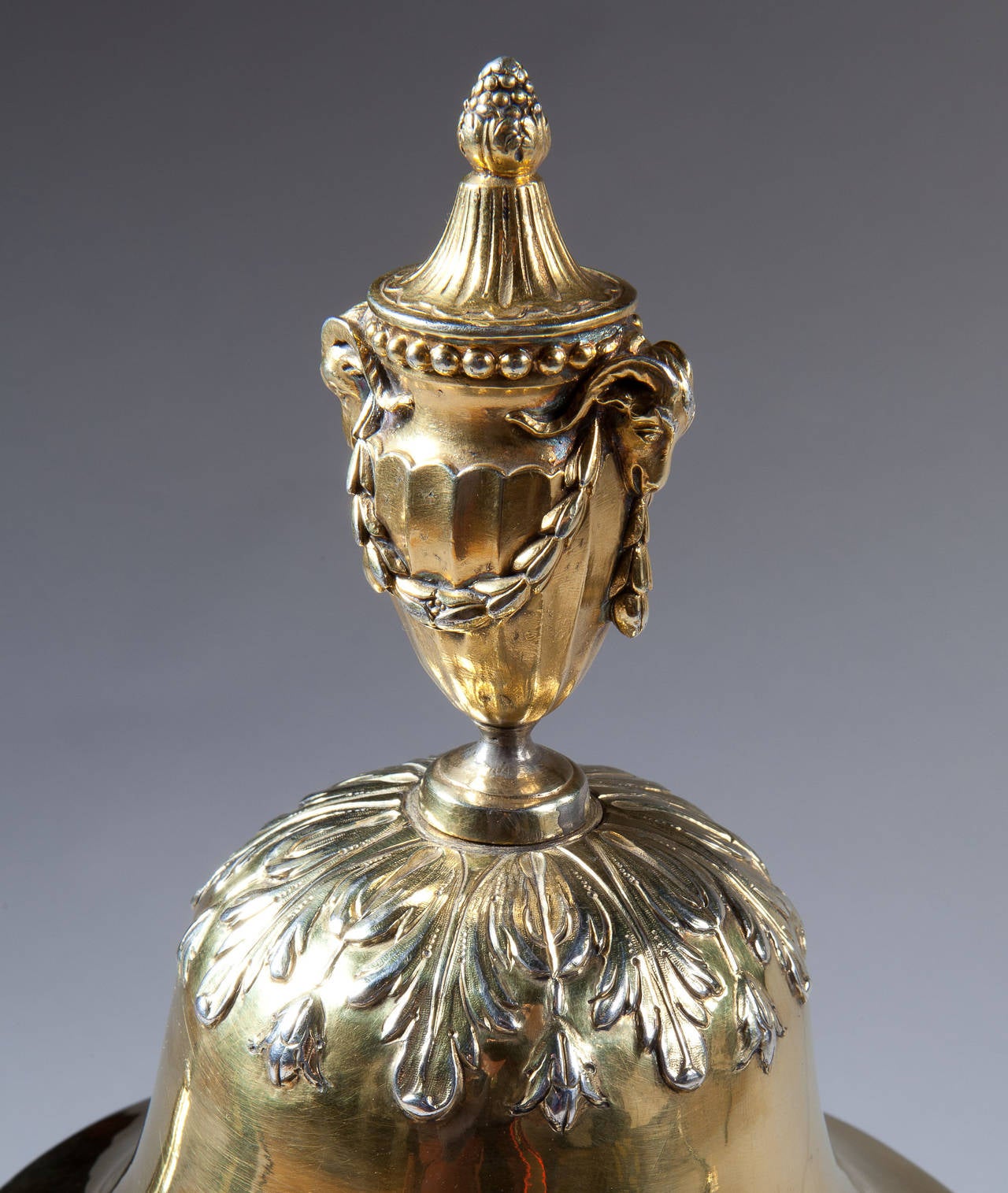 A rare and important Scottish Adam period silver gilt trophy vase and cover. Each element worked in fine detail and bedecked with neo-classical ornament.