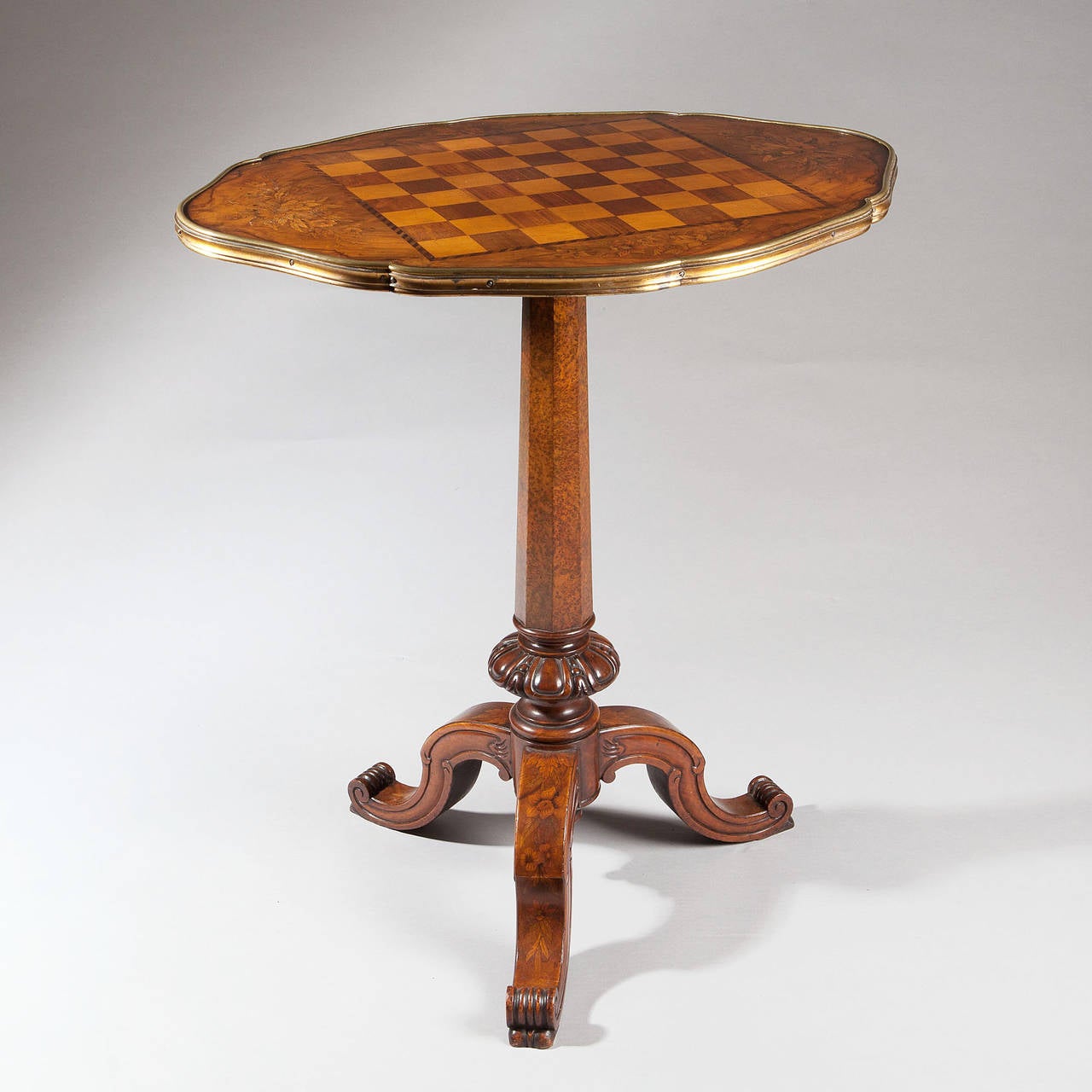 A 19th century Walnut Marquetry Games Table