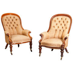 A fine pair of 19th century English bergere armchairs