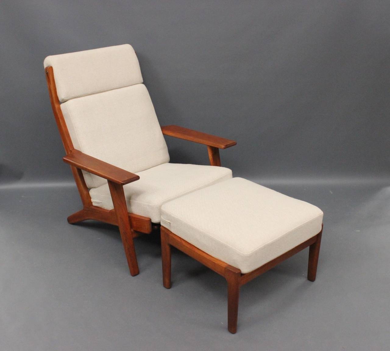 Hans J Wegner Lounge Chair With Footstool Model Ge290 In Teak