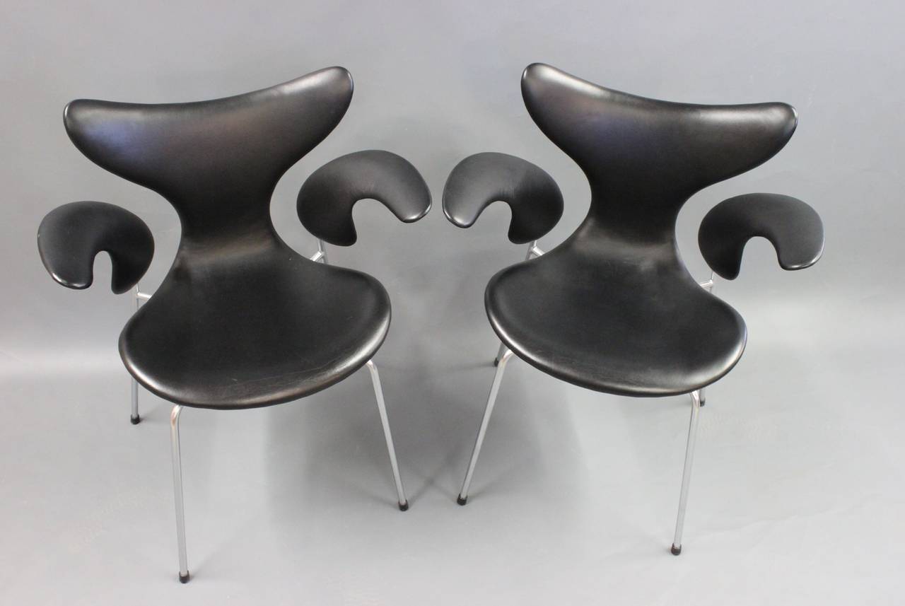 A pair of Arne Jacobsen Chairs Model 3108. Design from 1970 named The Seagull and The Lily. The Chairs are manufactured by Fritz Hansen in Black Leather.