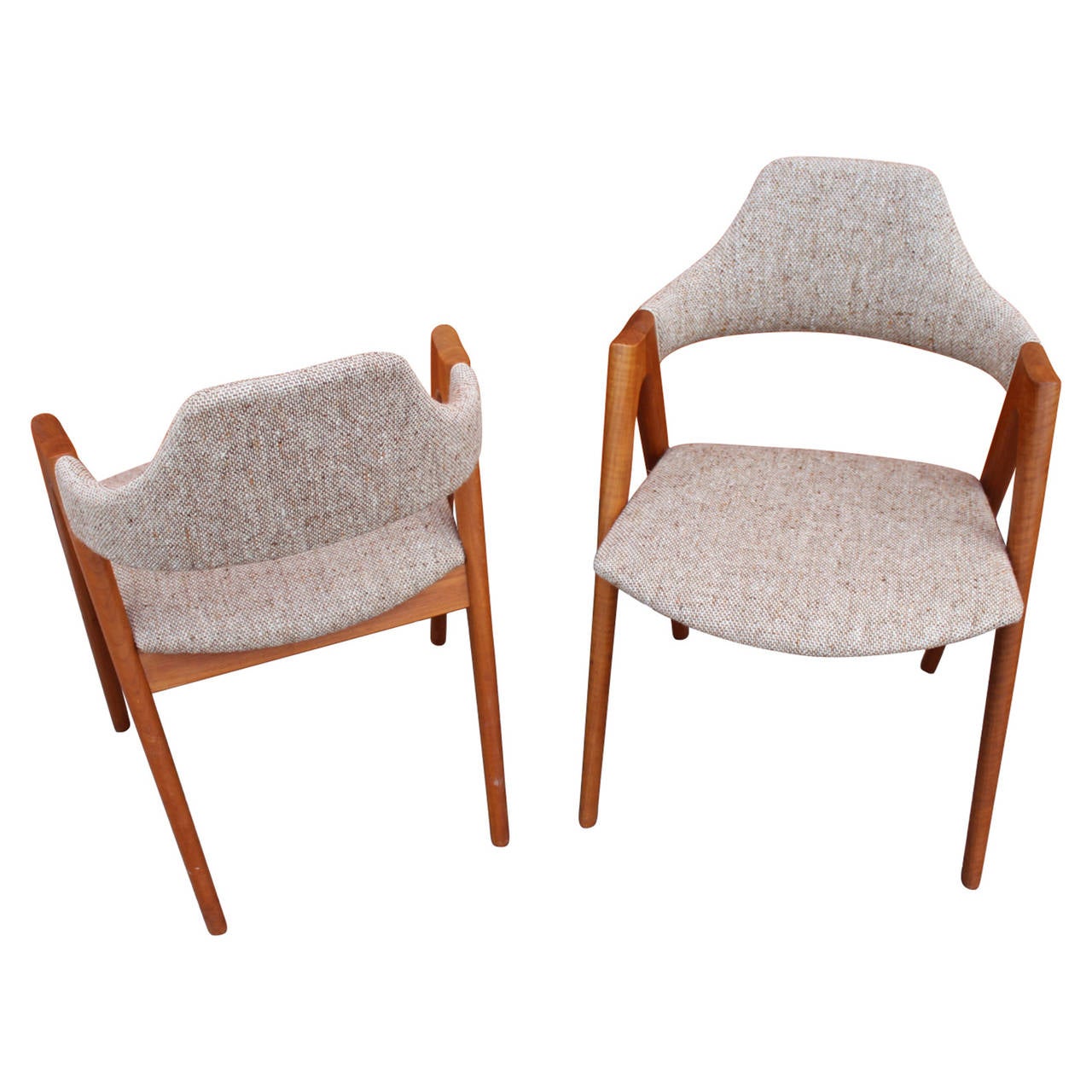 Compass dining chairs by Kai Kristiansen manufactured by Schou Andersen furniture factory, from 1960-1969. The chairs are made of teak and the seats are in wool. The model is rare.
