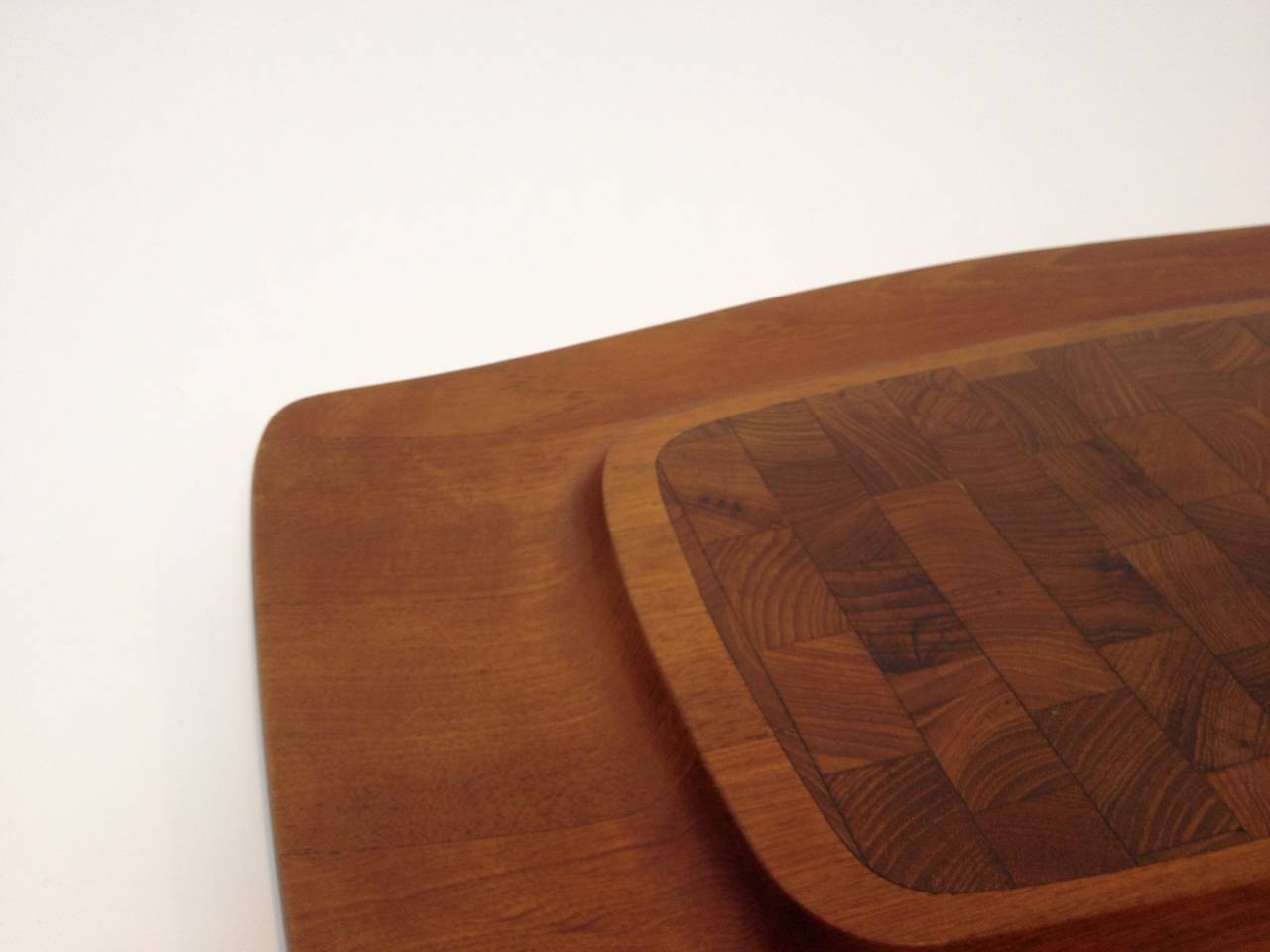Gorgeous Early 1960's teak cutting board/serving tray - designed by Jens.H. Quistgaard for Dansk Designs.  Lovely vintage condition. Perfect for cheese/crackers .......